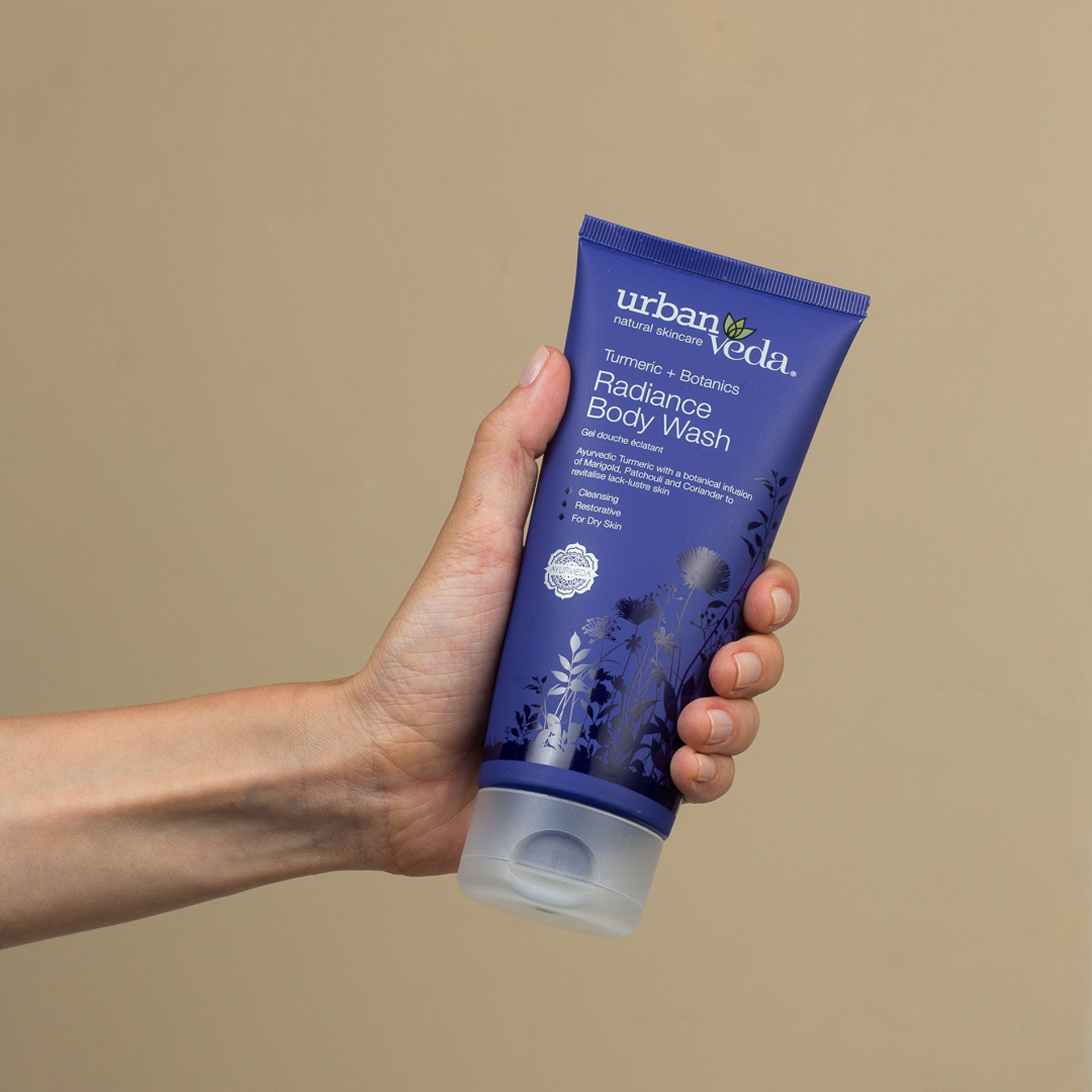 Brightening shower gel texture and lather for smooth radiant skin finish- urban veda